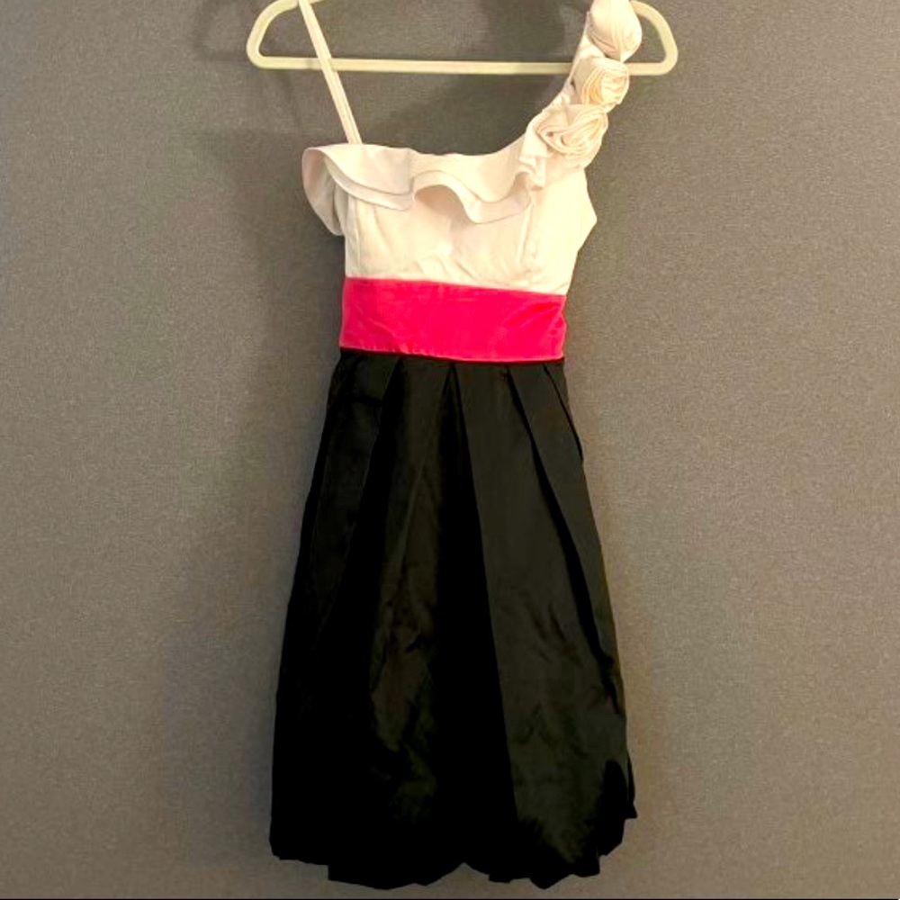 One single shoulder dress with floral accent
